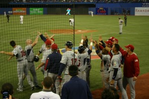Youkilis being congratulated after his 2 run home run