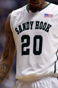 Xavier Musketeers forward Justin Martin (20) wears a jersey in tribute to the Sandy Hook School in the first half against the Wofford Terriers at the Cintas Center. (Photo by Frank Victores-USA TODAY Sports)