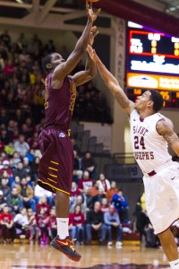 Iona Gaels guard Sean Armand (22) lets fly with  a jump shot. (Photo by Howard Smith-USA TODAY Sports)