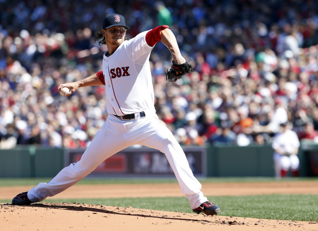 Clay Buchholz (11) throws a pitch against the Baltimore Orioles during the first inning at Fenway Park. (Photo by David Butler II-USA TODAY Sports)
