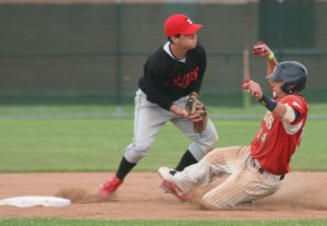 Wellsville's Dominic Zaher, right, is forced out at second by Geneva shortstop Andrew Goldstick during the first game of Sunday's doubleheader in Wellsville. (PAUL A. JANNACE/Wellsville Daily Reporter)