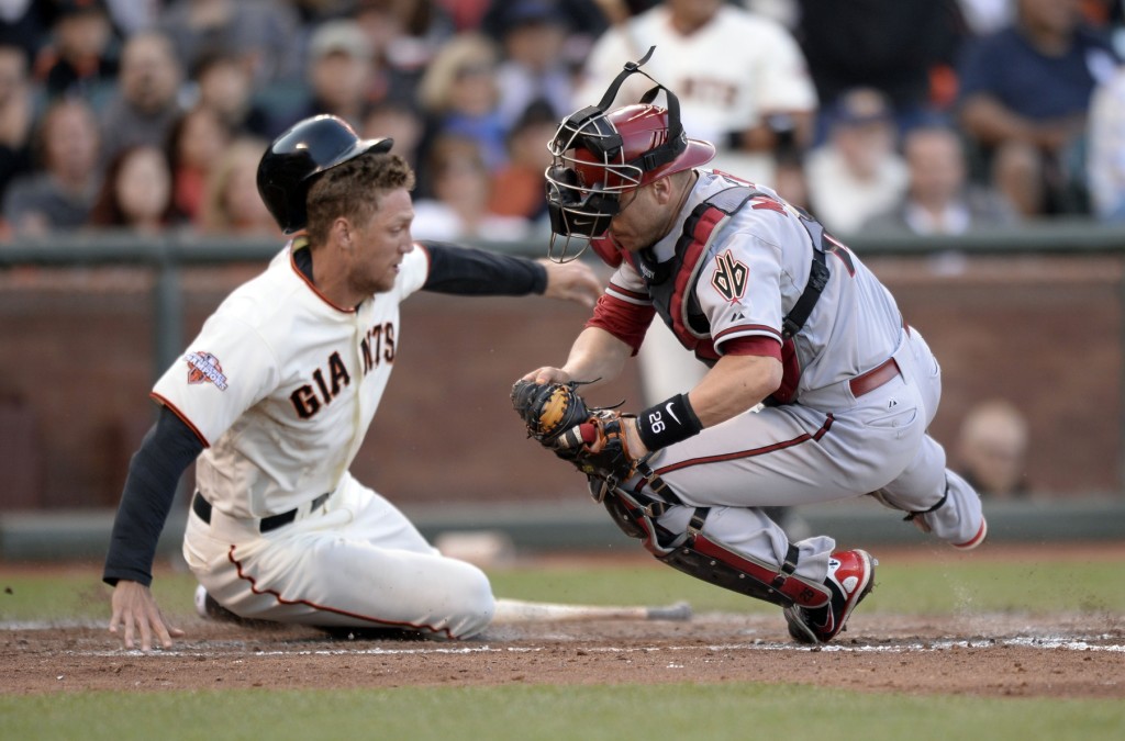 Hunter Pence (Schenectady '02) slides into home during recent MLB game. (Photo courtesy of USA Today Sports)