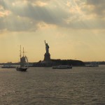 The Statue of Liberty and several tourist boats in New York’s Upper Bay, seen from the Staten Island Ferry.