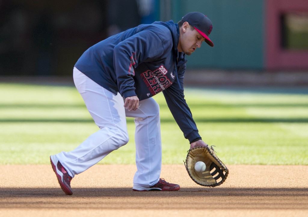 St. Louis Cardinals first baseman Allen Craig (21) takes ground balls during workouts a day before game three of the World Series against the Boston Red Sox at Busch Stadium. (Photo by Jeff Curry-USA TODAY Sports)