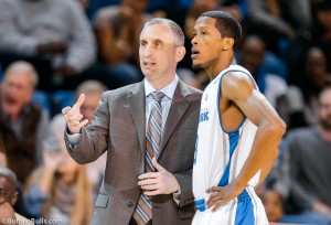 Hurley discusses strategy with Jarod Oldham during a recent game. (Photo courtesy of UB Athletics)