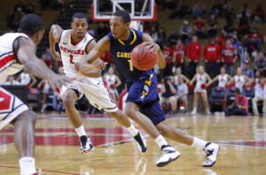 Lewis (1), seen here against Rutgers, hit 7 of 10 shots behind the arc as part of a career high 25 points. (Photo:  Jim O'Connor-USA TODAY Sports)