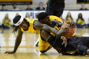 VCU's Weber gets on the floor in recent battle with La Salle and T. Garland. (Photo by H. Smith-USA TODAY Sports)