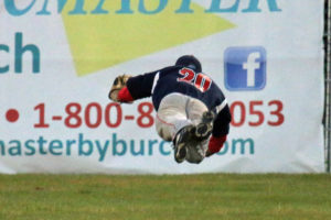 Nick DeRegis made a running diving catch in deep center field to rob Outlaw leadoff hitter Ben Mauseth of an extra base hit in the first inning of the second game of the double header.  The Salt Cats held on to win the nightcap. (Photo by Brian Horey a/k/aBRIANthePHOTOguy)