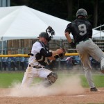 Oneonta's Carson Waln applies the tag to Alex Saville (#9) for the final out of the series. (Photo by Hannah Backus)