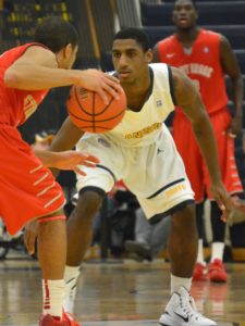 Jeremiah Williams and the Canisius defense are shrinking the court. (Photo  by Johnathan Snyder/ WNY Big 4 Talk)