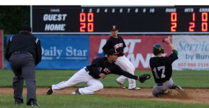 Oneonta outlaw second baseman Greg Saenz taking a throw from catcher Cody Miller tags out Sherrill Silversmith right fielded Dan Lowdnis for the second out in the top of the third inning in the Outlaws season and home opener. (Photo: Brian C. Horey   a/k/a BRIANthePHOTOguy)