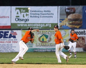 Oneonta Outlaw short stop Tyler Martis shows nice range as he fields a ball deep behind and to the right of second base and throws the Geneva Red Winger out as well for the second out in the top of the eight inning as the Outlaws clung to a 2-0 lead but went on the win it 3-0. Second baseman Griffin Barnes and center fielder CJ Krowiak backup the play. (Photo by BRIAN HOREY a/k/a BRIANthePHOTOguy)