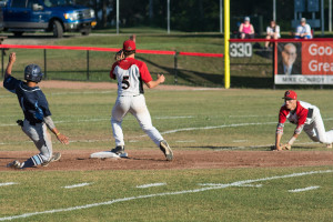 Cole Peterson goes to his knees to make the inning-ending play in the first. (PHOTO by SUE KANE @skane51)