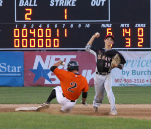Olean Oiler short stop Cole Peterson turns a double play as Oneonta Outlaw CJ Krowiack is out at second in the bottom of the seventh. (Photo by BRIAN HOREY a/k/a BRIANthe PHOTOguy)