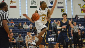 Jamal Reynolds (21) registered his third double-double of the season in the loss. (Photo by JOHNATHAN SNYDER/WNY Big 4 Talk) 