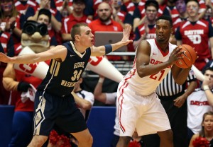 George Washington Colonials forward Tyler Cavanaugh (34) defends against Dayton Flyers forward Dyshawn Pierre (21) in the first half at the University of Dayton Arena.(Photo: Aaron Doster-USA TODAY Sports)