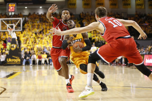 JeQuan Lewis (1) dribbles the ball between Richmond Spiders forward Terry Allen (15) and forward T.J. Cline (10) during the second half at Stuart Siegel Center. The Rams won 87-74. (Photo: Amber Searls-USA TODAY Sports)