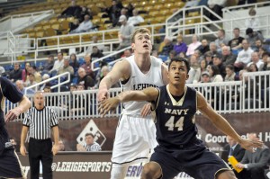Tim Kempton (left), who also garnered his second consecutive Patriot League Player of the Year award, averaged 17.7 points and 9.5 rebounds per game in 2015-16. (Photo: Justin Lafleur/Lehigh Athletics)