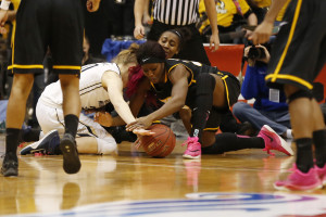 George Washington Colonials guard Hannah Schaible (20) and Virginia Commonwealth Lady Rams guard/forward Adaeze Alaeze (20) battle for loose ball in the third quarter during the women's Atlantic 10 Conference tournament at Richmond Coliseum. The Colonials won 72-58. (Photo: Geoff Burke-USA TODAY Sports)