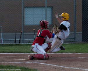 Chris Ruzzolo takes the throw from TJ Lucey in right field for the final out of the fifth inning. Fairport advanced to the Class AA semi-finals with a 6-3 win over McQuaid. (Photo: SUE KANE)