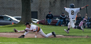 Churchville-Chili first baseman, Tommy Carr secures the final out of the game as the Saints defeat Webster-Thomas , 2-0 in Section V Class AA first round action. (Photo: SUE KANE)