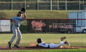 Cole Peterson (19) is safe at second with a stolen base. Peterson scored four runs in Olean's 22-6 victory in game one of the Western Division Championship Series. (Photo: SUE KANE) 