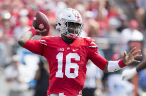 J.T. Barrett threw for a personal-best 349 yards and rushed for 30 yards for 379 total offensive yards and extended his own school-record for 300-yard total offense games to 12.(Photo: Greg Bartram-USA TODAY Sports)