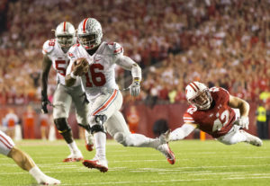 J.T. Barrett (16)  was 17 of 29 passing for 226 yards and one touchdown, and also ran 21 times for 92 yards and two scores in the 30-23 overtime victory.(Photo: Jeff Hanisch-USA TODAY Sports)