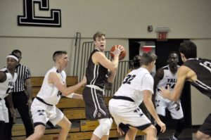 Tim Kempton (center) netted a career-high 30 points in the loss. (Photo: Justin Lafleur/Lehigh Athletics.)
