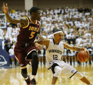 Justin Robinson (12) netted 68 points in three games, an average of 22.7, while hitting the 20-point marker in all three contests. He did so while shooting 48.7 percent from the field and 52.9 percent from beyond the arc, pitching in 11 boards, 14 assists and six steals. (Photo: Noah K. Murray-USA TODAY Sports)