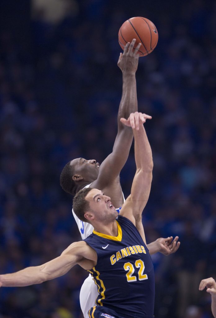 Aquinas alum Phil Valenti (22) battles for a rebound the Canisius season opener against then No. 2 Kentucky. (Photo : Mark Zerof-USA TODAY Sports)