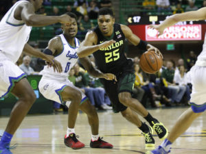 Baylor Bears guard Al Freeman (25) drives the ball around Florida Gulf Coast Eagles guard Brandon Goodwin (0) during the first half of a mens NCAA basketball game at Ferrell Center. (Photo: Jim Cowsert-USA TODAY Sports)