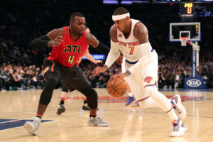 Carmelo Anthony (7) drives past Atlanta Hawks forward Paul Millsap (4) during the first quarter at Madison Square Garden. (Photo: Anthony Gruppuso-USA TODAY Sports)