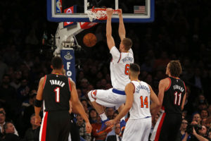 Kristaps Porzingis (6) finishes with a jam against the Portland Trail Blazers during the first half at Madison Square Garden. (Photo: Adam Hunger-USA TODAY Sports)