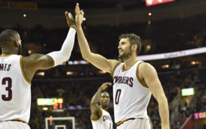 LeBron James (23), guard Iman Shumpert (4) and forward Kevin Love (0) celebrate in the fourth quarter against the Portland Trail Blazers at Quicken Loans Arena. (Photo: David Richard-USA TODAY Sports)