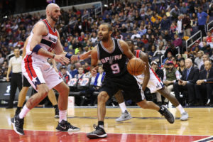 San Antonio Spurs guard Tony Parker (9) dribbles the ball as Washington Wizards center Marcin Gortat (13) defends in the third quarter at Verizon Center. The Spurs won 112-100. (Photo: Geoff Burke-USA TODAY Sports)