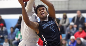 Patrick Thomas (3) goes to the basket in Bishop Kearney's win Saturday night over St. Mary's (Manhassett). (Photo: Ron Kalasinkas)