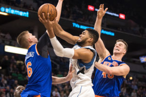 Minnesota Timberwolves forward Karl-Anthony Towns (32) shoots over New York Knicks forward Kristaps Porzingis (6) and center Marshall Plumlee (40) during the fourth quarter at Target Center. The Knicks defeated the Timberwolves 106-104. (Photo: Brace Hemmelgarn-USA TODAY Sports)