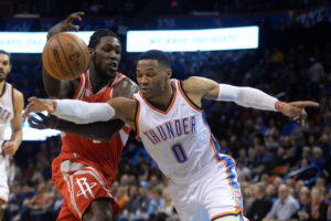 Russell Westbrook (0) attempts to steal the ball from Houston Rockets forward Montrezl Harrell (5) during the second quarter at Chesapeake Energy Arena. (Photo: Mark D. Smith-USA TODAY Sports)