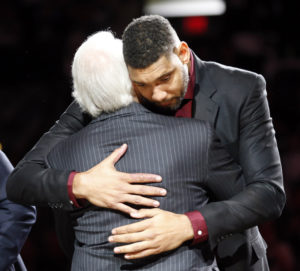 Former San Antonio Spurs power forward Tim Duncan hugs head coach Gregg Popovich during a ceremony after an NBA basketball game between the Spurs and the New Orleans Pelicans. (Photo: Soobum Im-USA TODAY Sports)