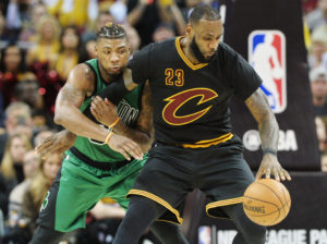 Marcus Smart (36) defends Cleveland Cavaliers forward LeBron James (23) during the second half at Quicken Loans Arena. The Cavs won 124-118. (Photo: Ken Blaze-USA TODAY Sports)