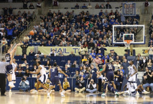 Notre Dame Fighting Irish guard Steve Vasturia (far left) lets fly with game-winning three point shot with 3.8 seconds left in overtime against the Pittsburgh Panthers at the Petersen Events Center. Notre Dame won 78-77 in overtime. (Photo: Charles LeClaire-USA TODAY Sports)