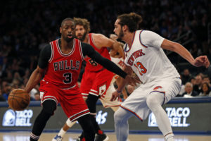 Dwyane Wade (3) drives to the basket past New York Knicks center Joakim Noah (13) during the second half at Madison Square Garden. (Photo: Adam Hunger-USA TODAY Sports)