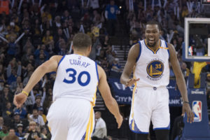 Kevin Durant (35) celebrates with Stephen Curry (30) during the third quarter against the Cleveland Cavaliers at Oracle Arena. The Warriors defeated the Cavaliers 126-91. (Photo: Kyle Terada-USA TODAY Sports)