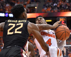  John Gillon (4) battles with Xavier Rathan-Mayes (22)  during the second half of a game at the Carrier Dome. Syracuse won the contest 82-72. (Photo: Mark Konezny-USA TODAY Sports)