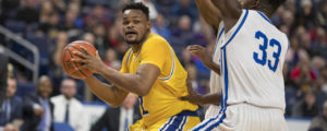  junior Jermaine Crumpton recorded his first career double-double with a career-high 32 points and 10 rebounds. Courtesy: www.tomwolf.smugmug.com)