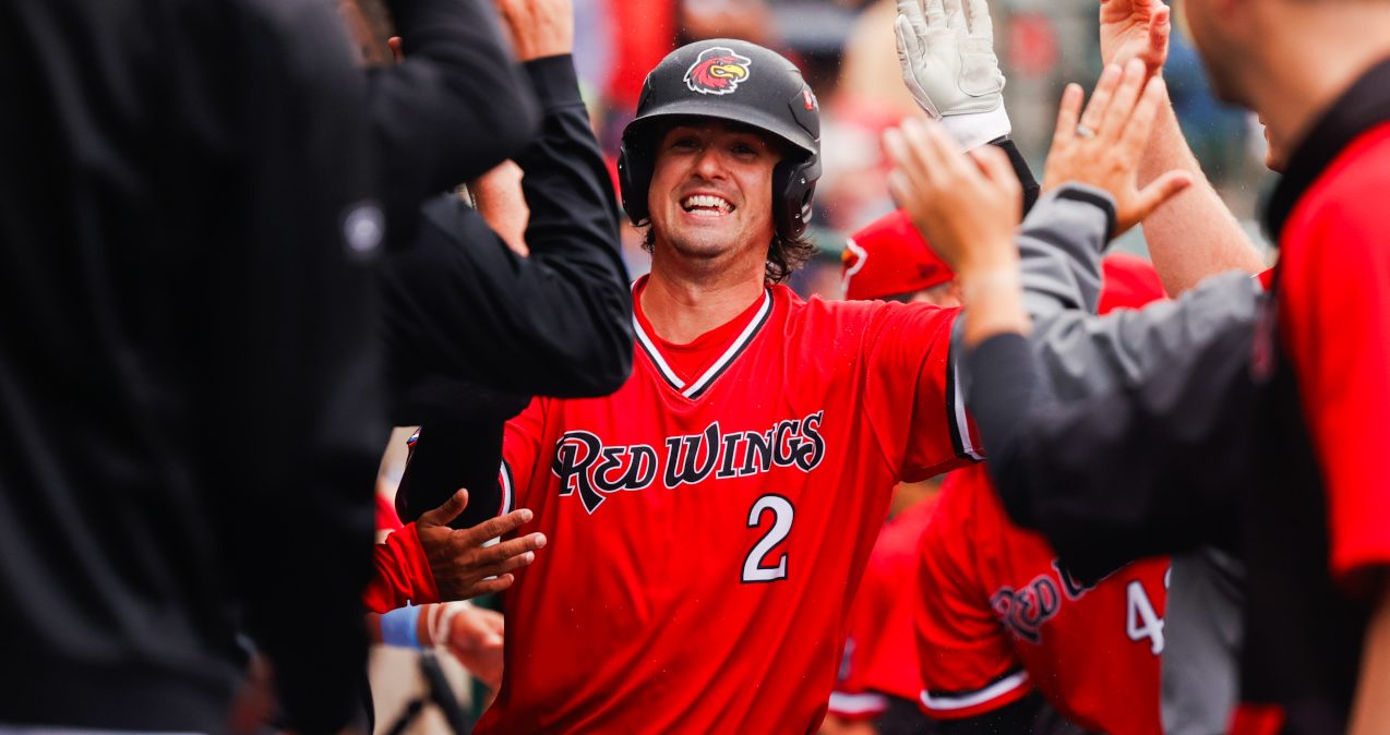 Hayes and homers power Wings to 9-7 victory as team sets single-season home run record and moves into first
