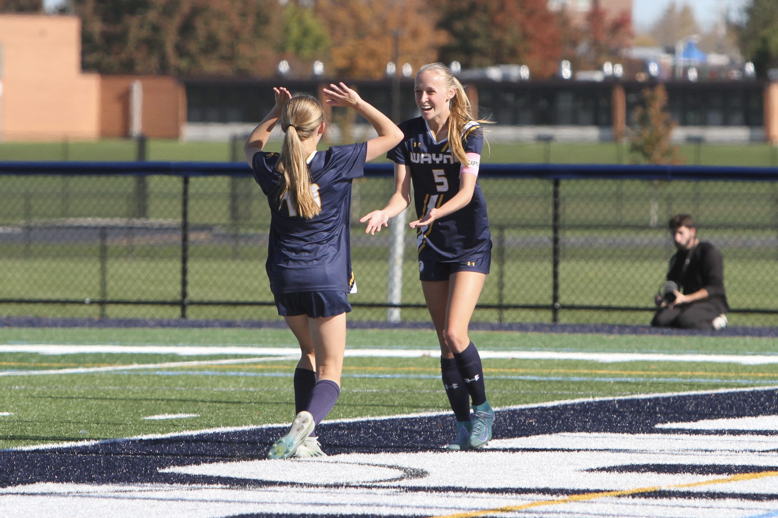 Wayne holds off late push to advance in Class A